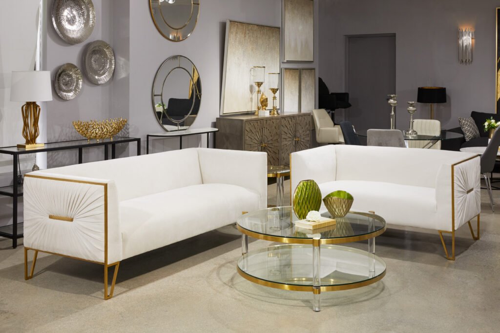 Valencia Vanilla Truro Gold Sofa with vanilla fabric upholstery and matte gold steel frame | Infinity Furniture Mississauga